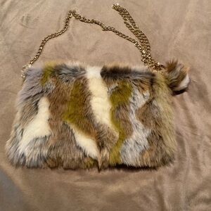 Statement Faux Fur Hobo Bag With Gold tone Chain Strap